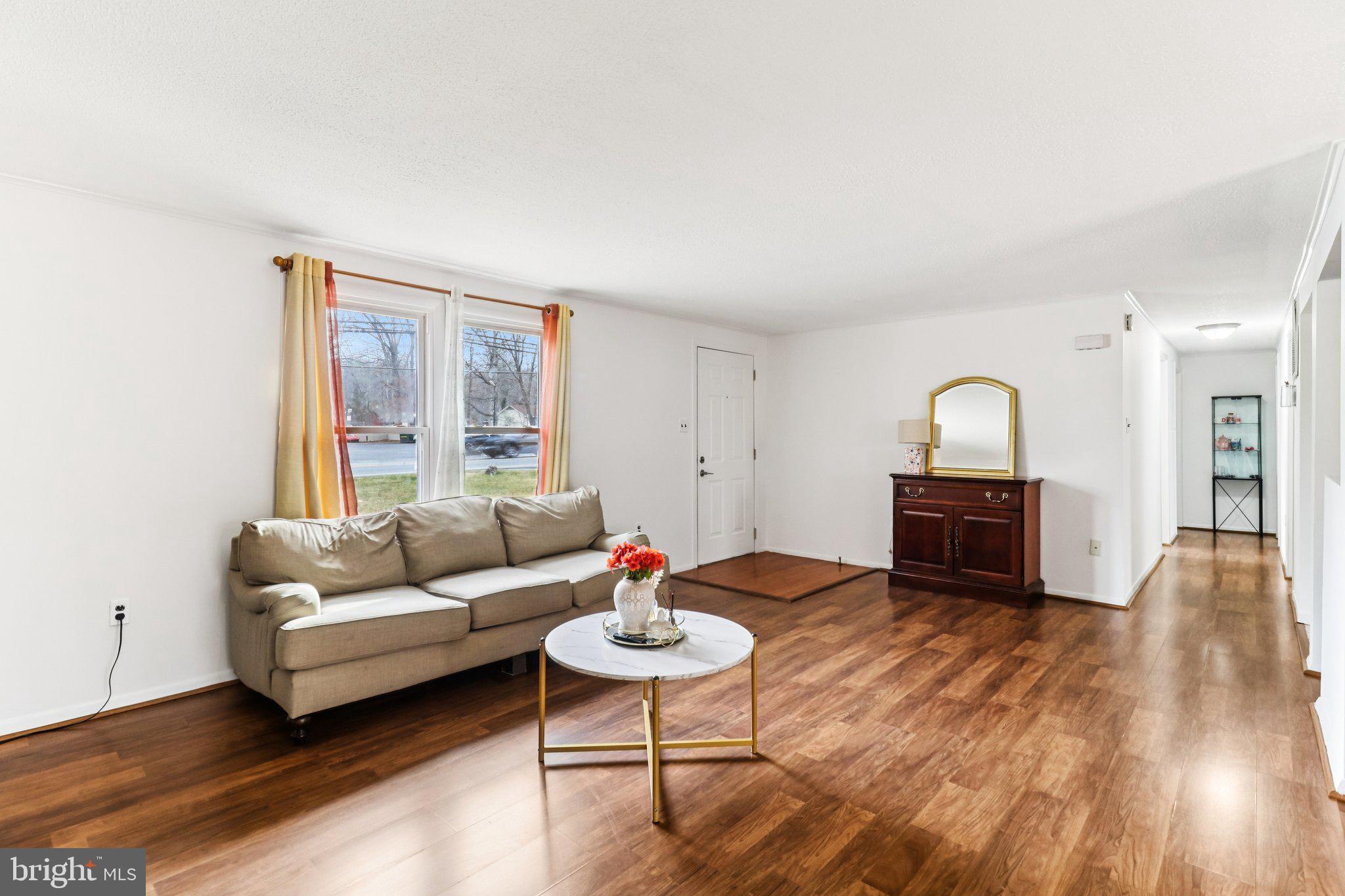 14617 Livingston Road Accokeek, MD 20607 - Photo 7 of 53 a living room with furniture and a wooden floor
