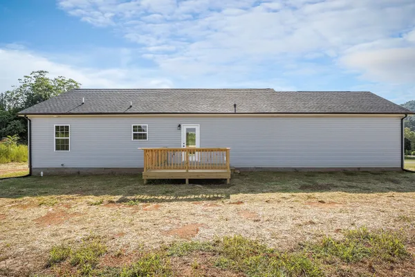 a view of kitchen view with wooden floor and window
