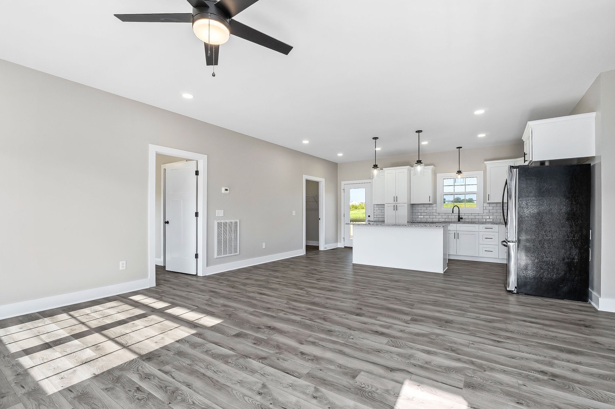 912 Frank Anderson Road Sparta, TN 38583 - Photo 7 of 28 a view of kitchen view with wooden floor and window