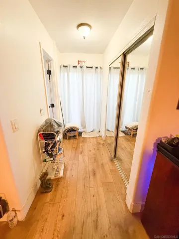 a view of a backyard with wooden fence