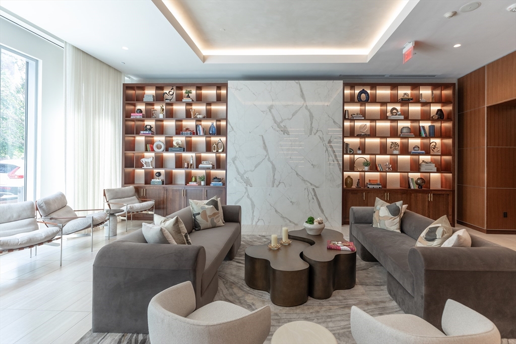 32 Traveler Street, Unit PH8 Boston, MA 02118 - Photo 23 of 38 a living room with furniture and a large window