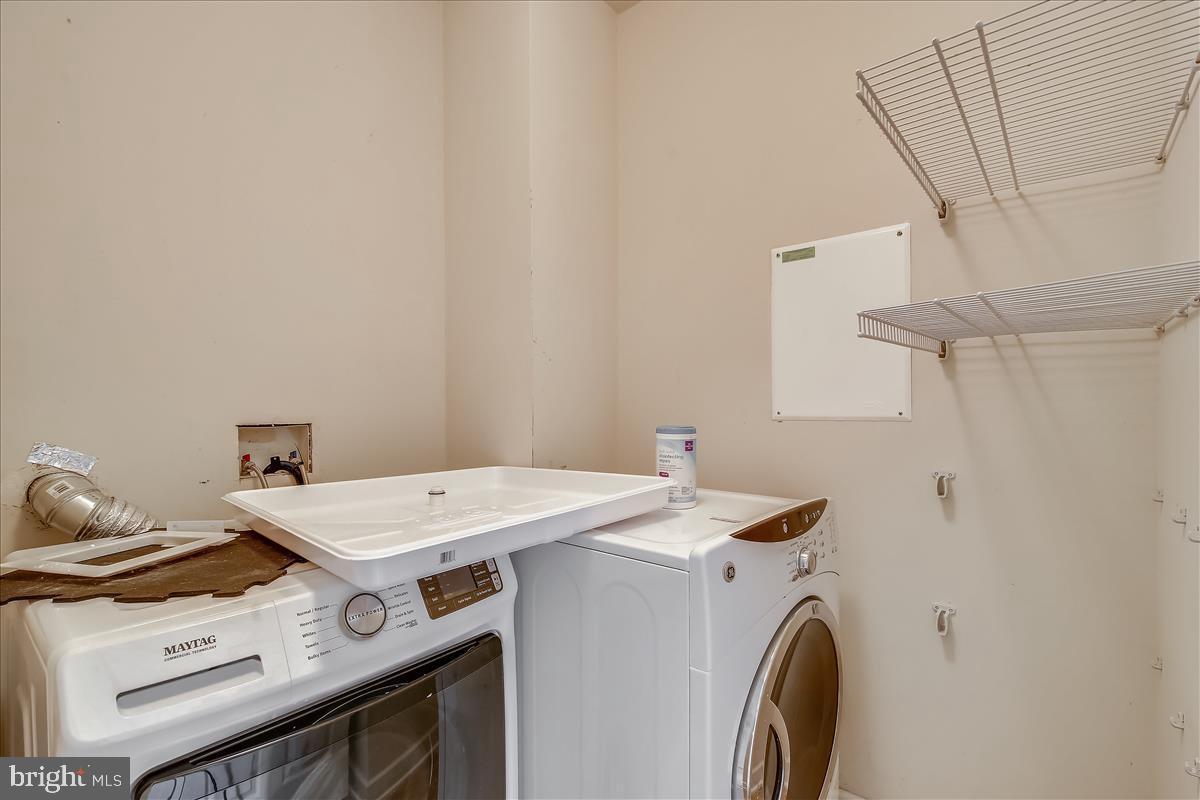 3602 Spring Hollow Lane Frederick, MD 21704 - Photo 24 of 25 a utility room with dryer and washer