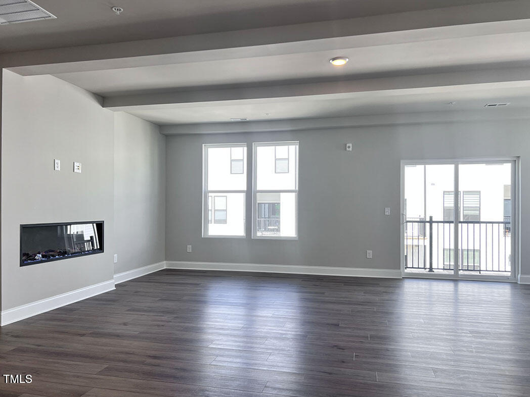 1247 Shaw View Alley, Unit 201 Raleigh, NC 27601 - Photo 13 of 49 LR to balcony