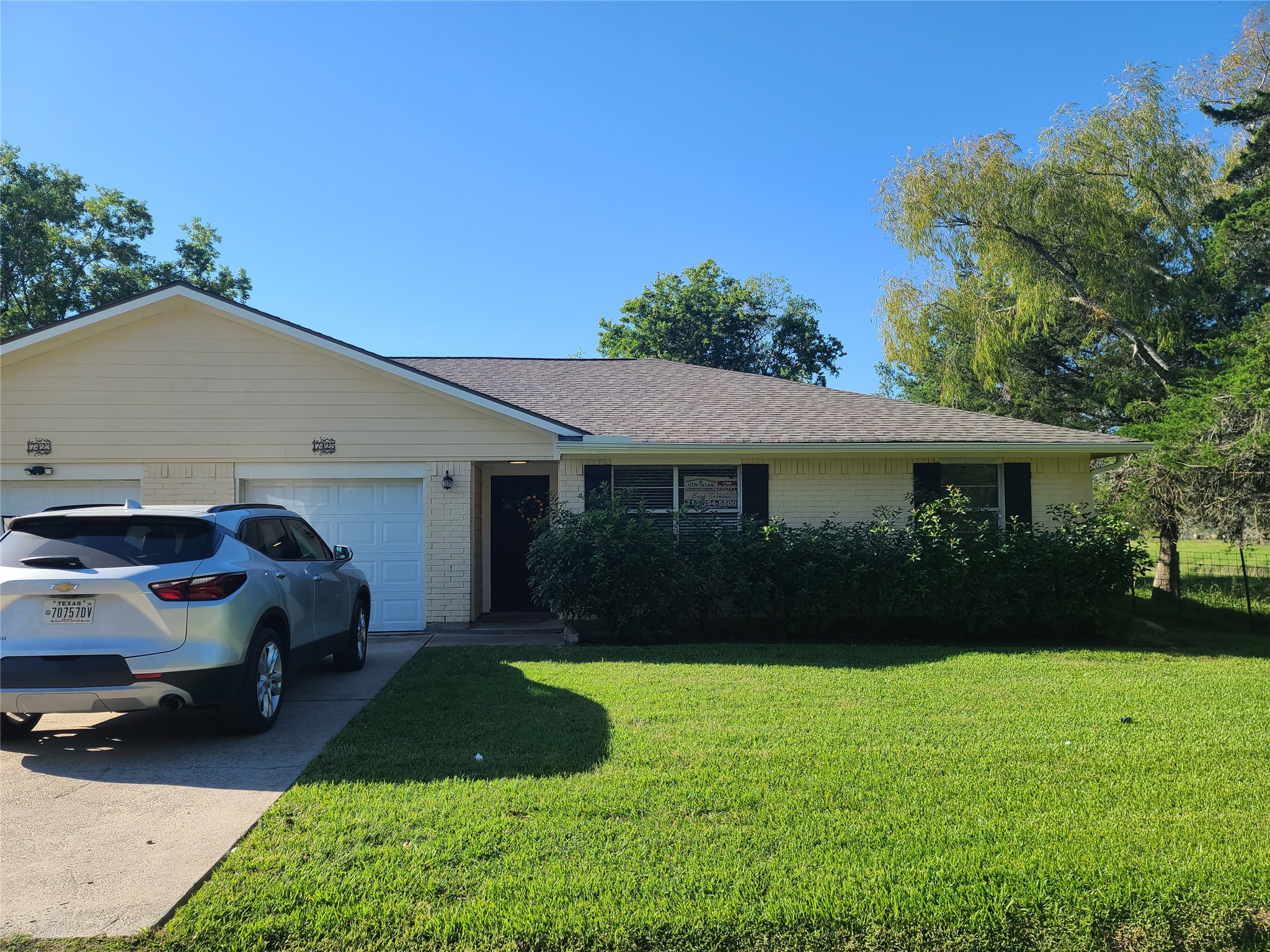 DUPLEX STREET VIEW - THE RENTAL INCLUDES GARAGE ON LEFT - 17425 SHOWN