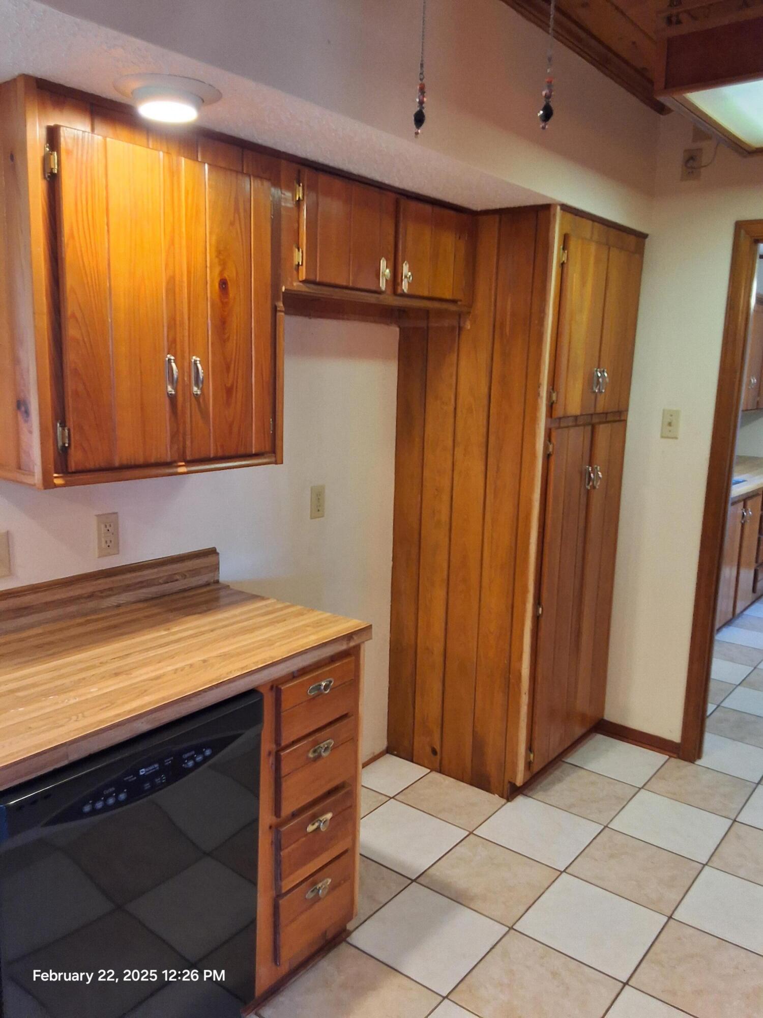 5652 Old Bethel Road Crestview, FL 32536 - Photo 2 of 23 a room with cabinets