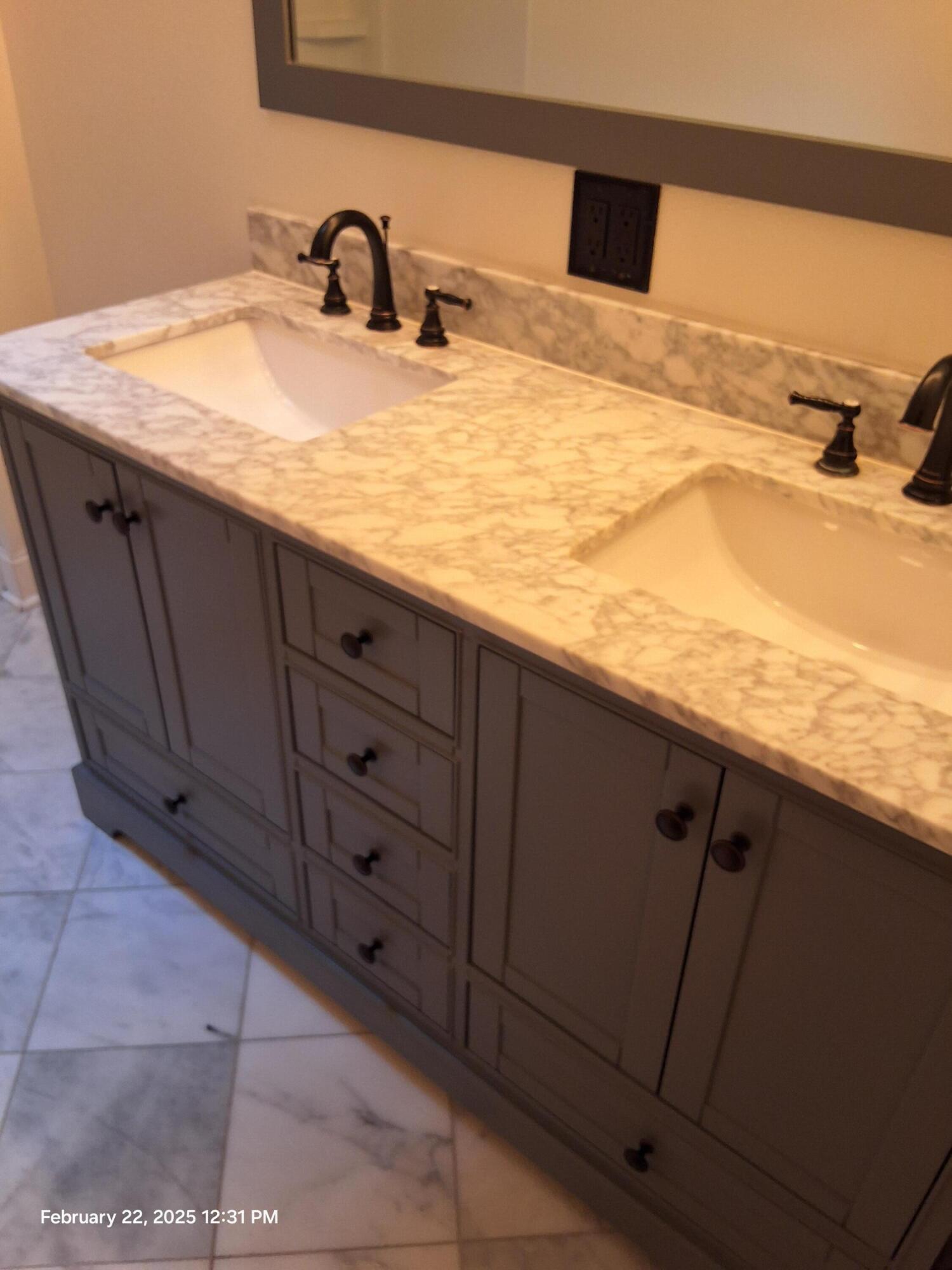 5652 Old Bethel Road Crestview, FL 32536 - Photo 22 of 23 a bathroom with a granite countertop sink and vanity