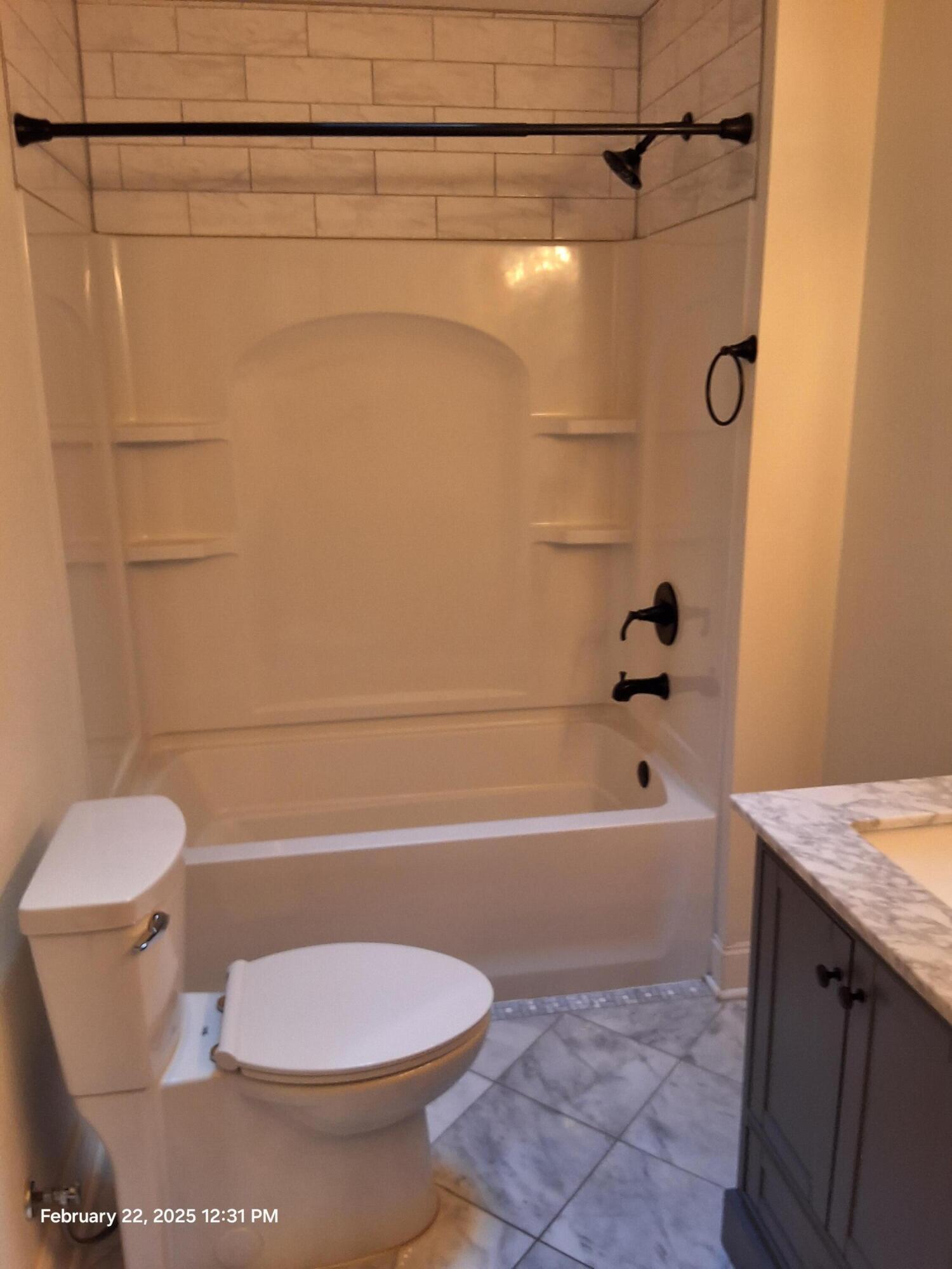 5652 Old Bethel Road Crestview, FL 32536 - Photo 23 of 23 a bathroom with a sink a toilet and a bathtub