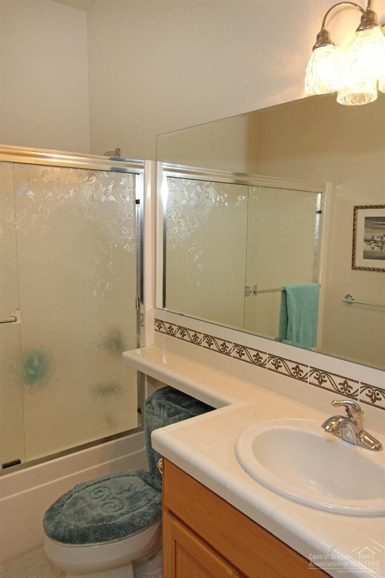 375 Southeast Soft Tail Loop Bend, OR 97702 - Photo 22 of 25 The guest bath. Tub and Shower!