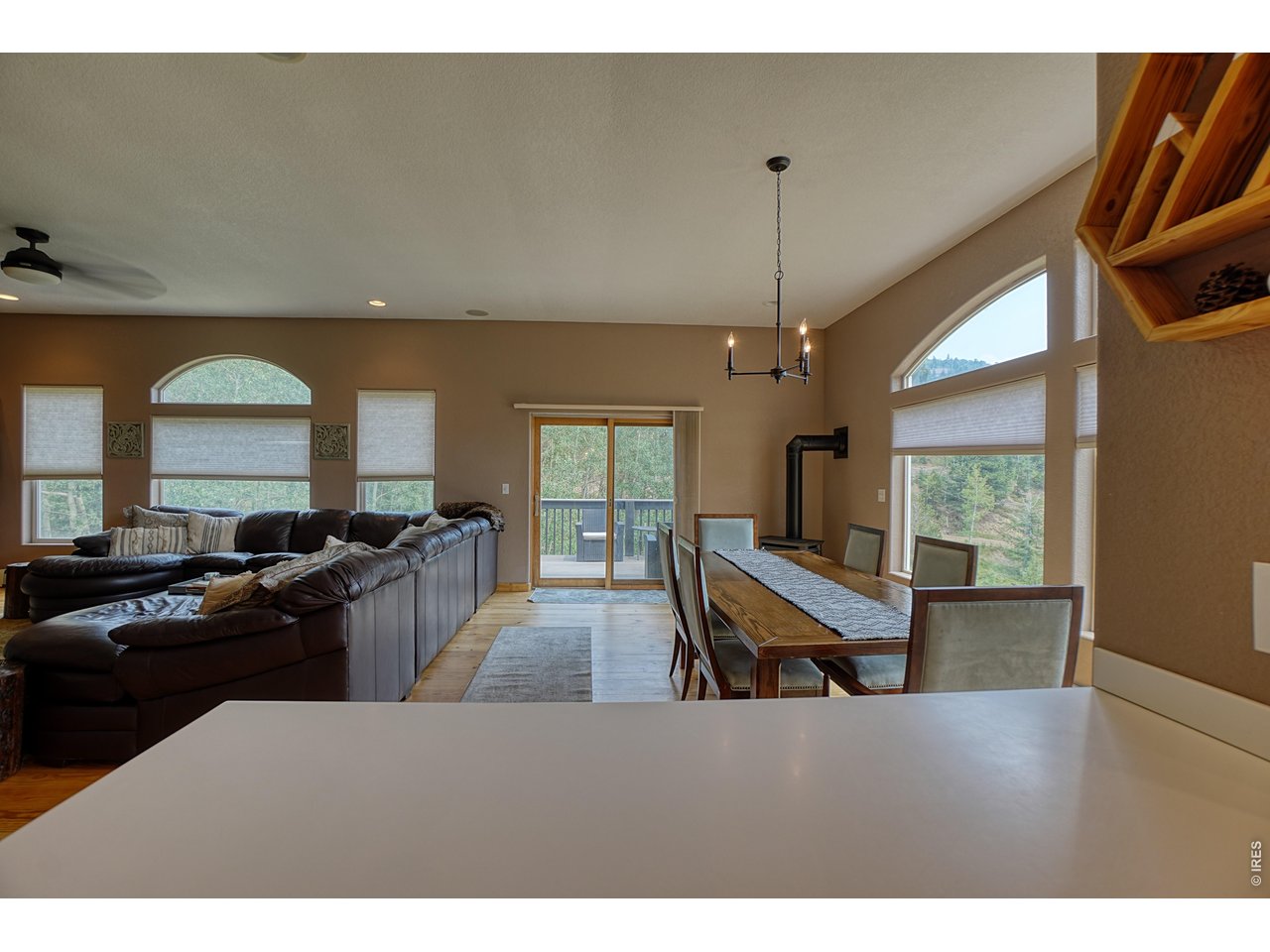 2353 Dory Hill Road Black Hawk, CO 80422 - Photo 8 of 50 Eat-in kitchen + Gorgeous dining area with incredible mountain views. Balcony access