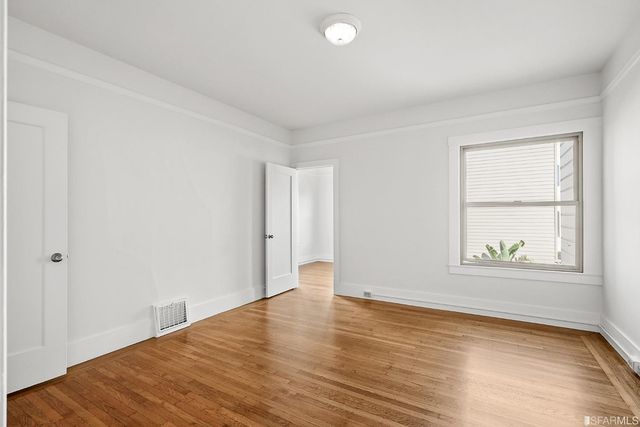 an outdoor space with patio and white umbrellas
