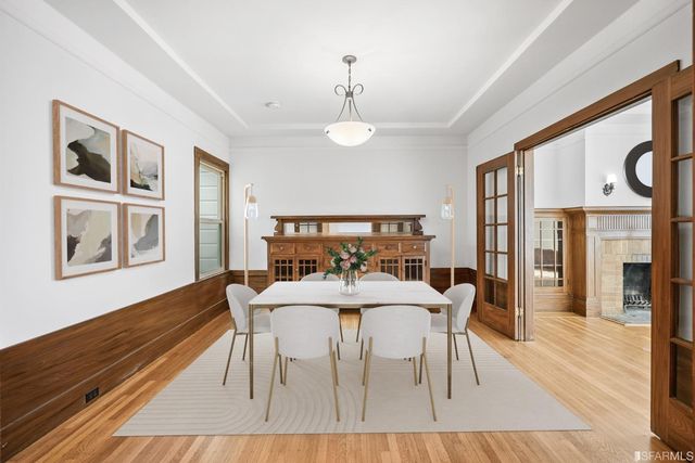 a kitchen with granite countertop a stove sink and cabinets