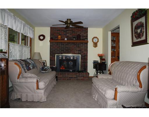 137 Heck Road Sarver, PA 16055 - Photo 3 of 12 Living Room. Spacious with wall of windows and wood burning fireplace ~!