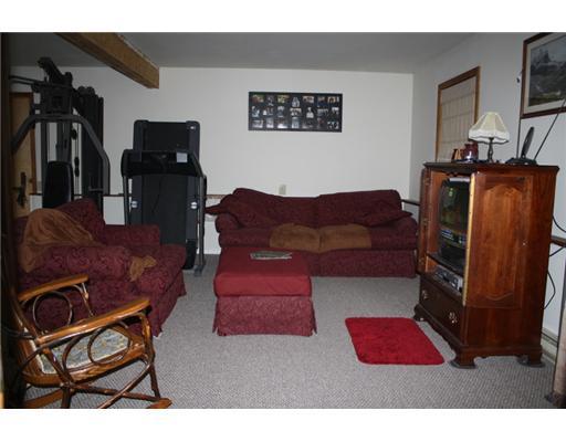 137 Heck Road Sarver, PA 16055 - Photo 10 of 12 Family Room. New carpeting throughout the Lower Level Family room w/ outside door to deck and pool! Powder room newly added