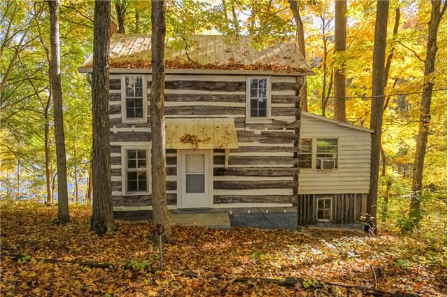 3875 East Lake Road Springfield, TN 37172 - Photo 1 of 18 Log cabin from early 1900's