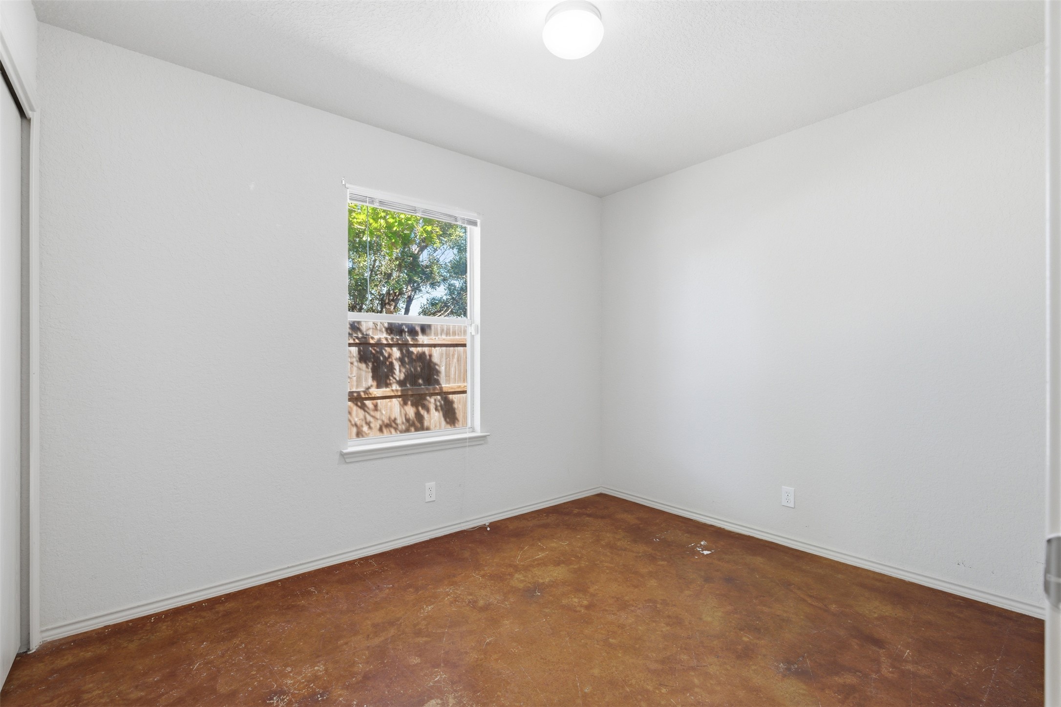 4529 Secure Lane, Unit 31 Austin, TX 78725 - Photo 14 of 38 an empty room with a window