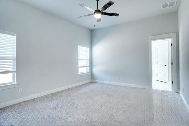 124 William Lane Godley, TX 76044 - Photo 17 of 32 an empty room with windows and fan