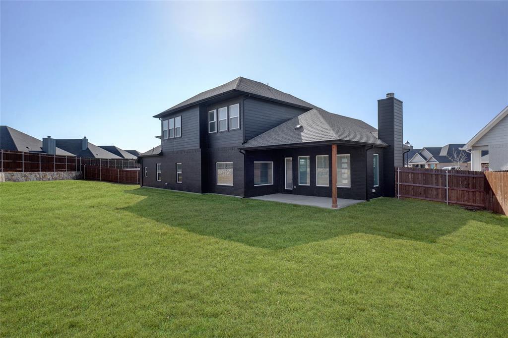 124 William Lane Godley, TX 76044 - Photo 29 of 32 a view of a house with a backyard