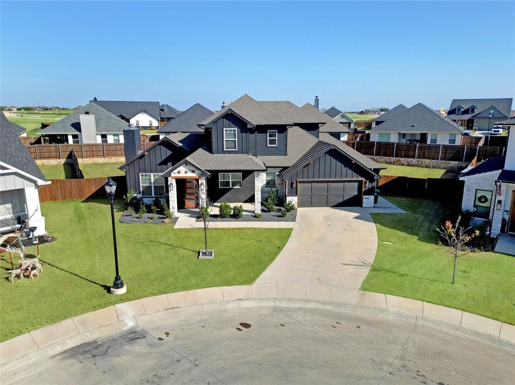 124 William Lane Godley, TX 76044 - Photo 30 of 32 an aerial view of a house