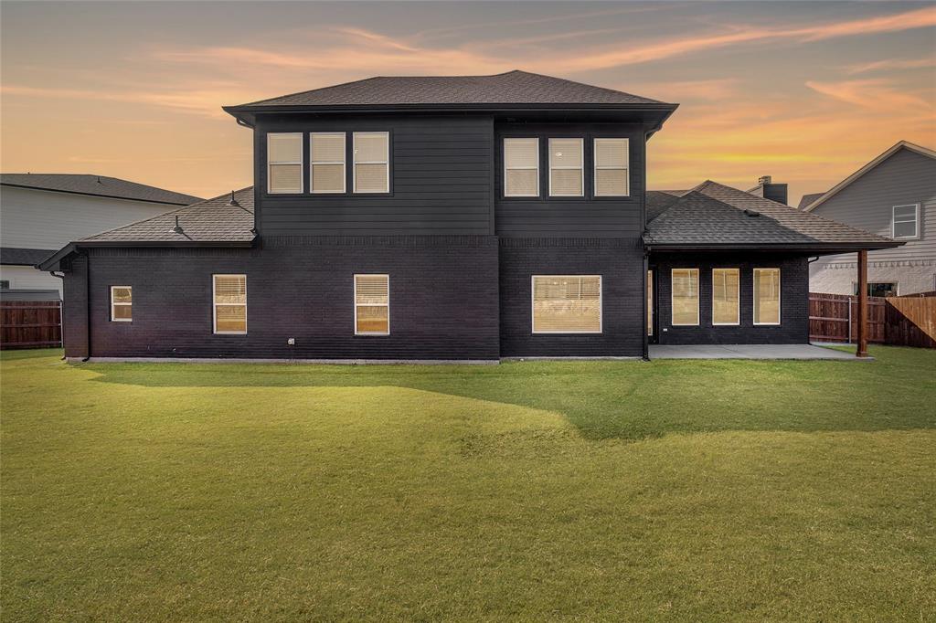 124 William Lane Godley, TX 76044 - Photo 35 of 35 a front view of a house having yard