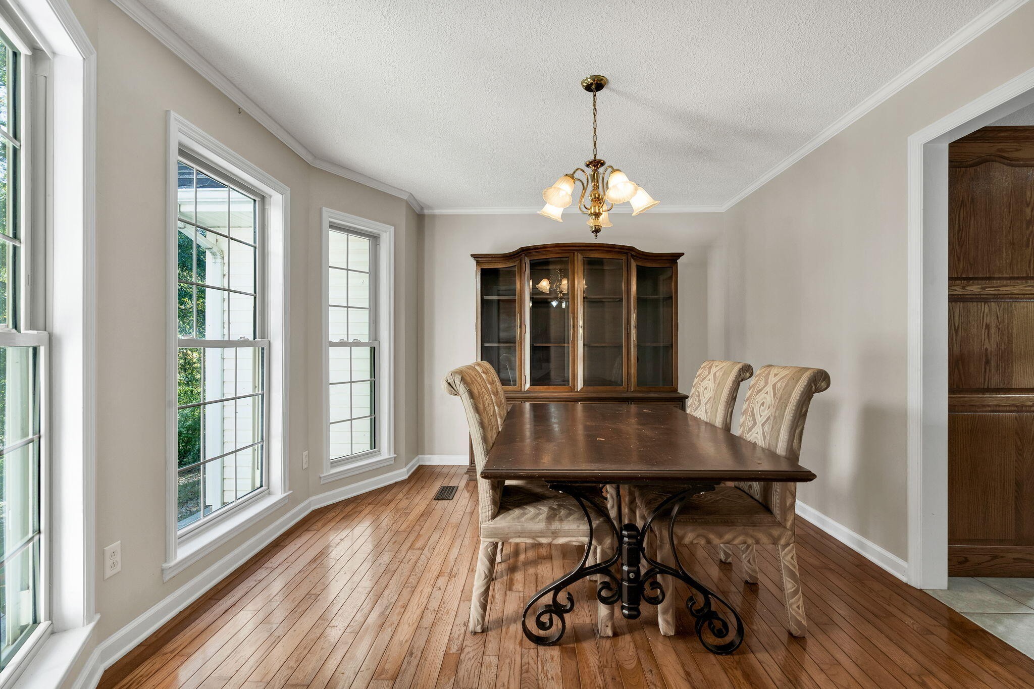 1582 Eads Bluff Road Northwest Georgetown, TN 37336 - Photo 12 of 57 a view of a dining room with furniture wooden floor and chandelier