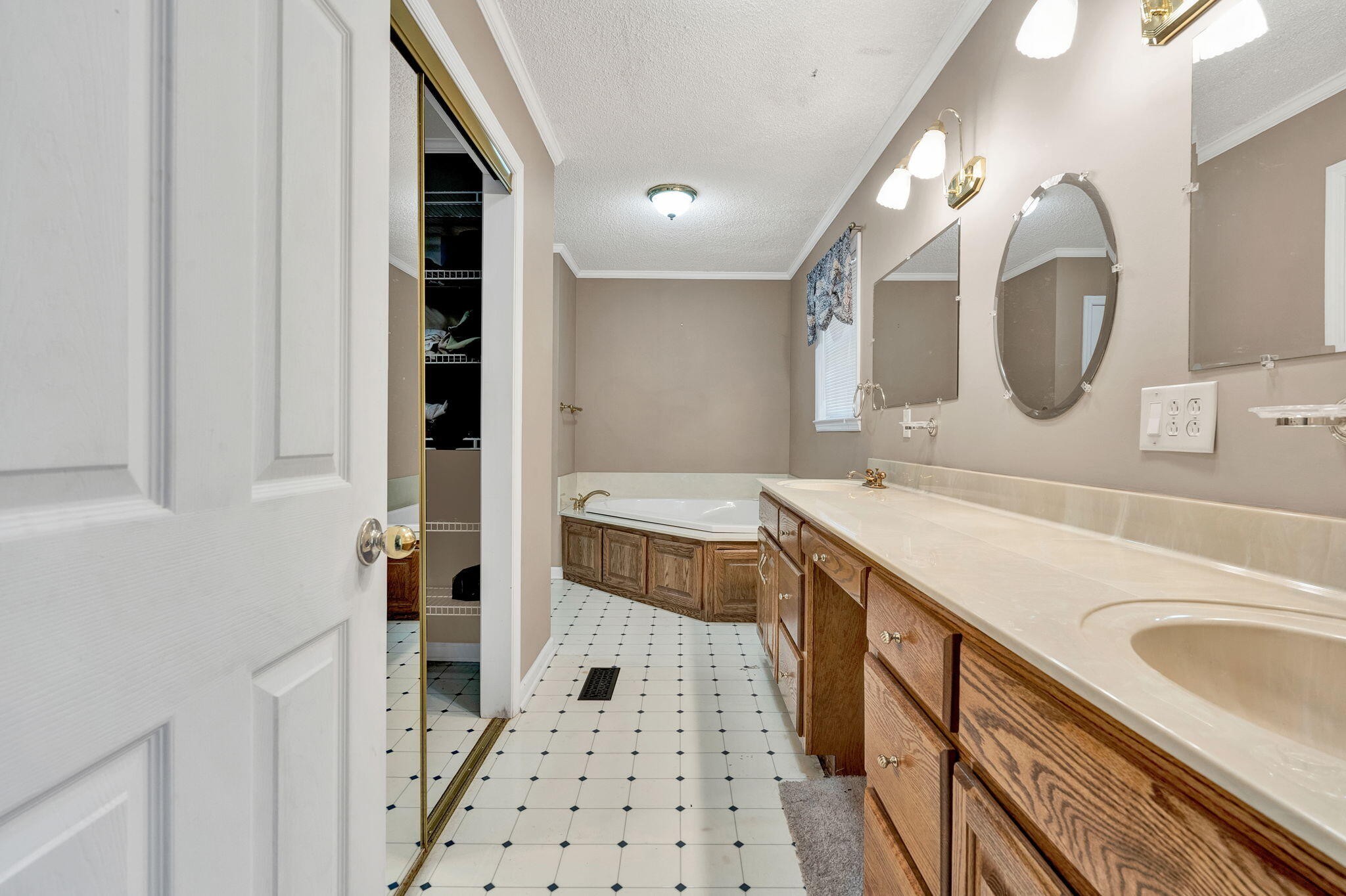 1582 Eads Bluff Road Northwest Georgetown, TN 37336 - Photo 17 of 57 a spacious bathroom with a sink a large mirror and a shower