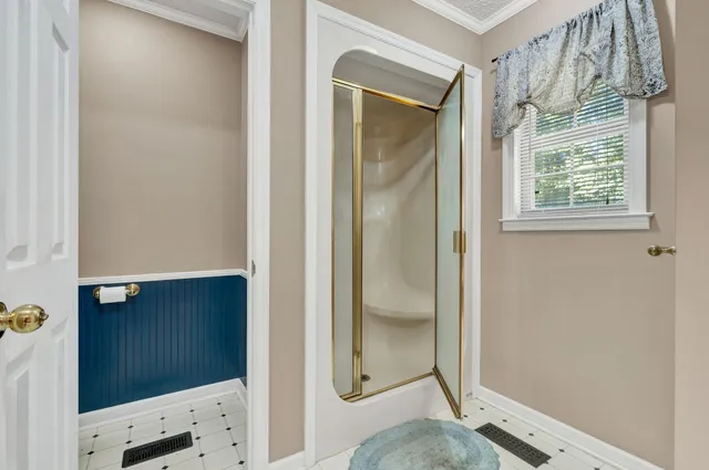 a view of a porch with a floor to ceiling window