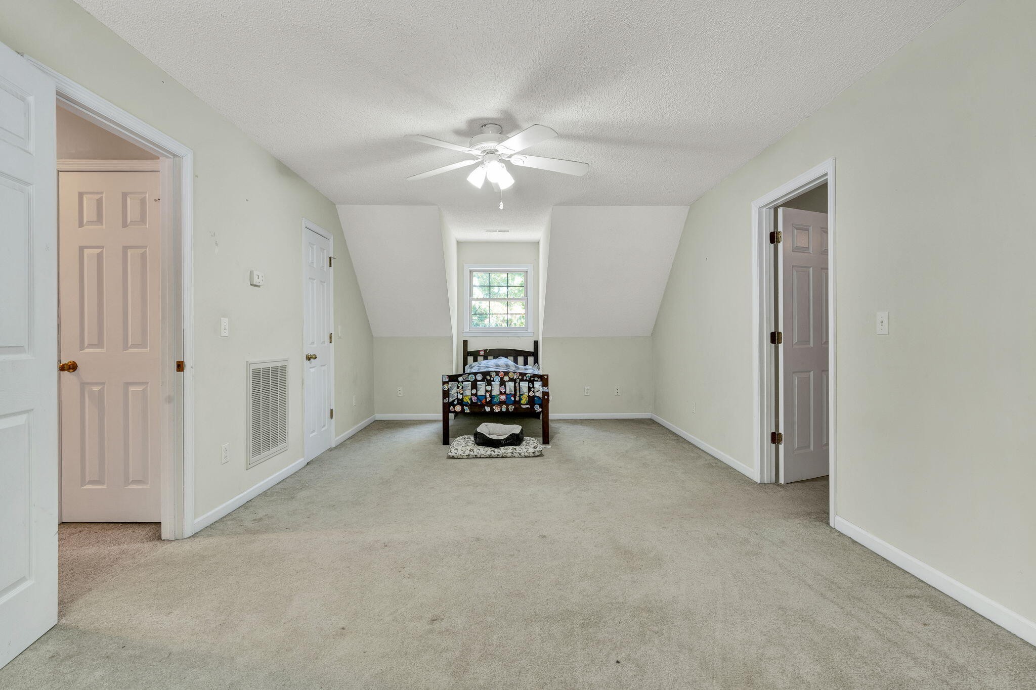 1582 Eads Bluff Road Northwest Georgetown, TN 37336 - Photo 29 of 57 an empty room with chandelier fan