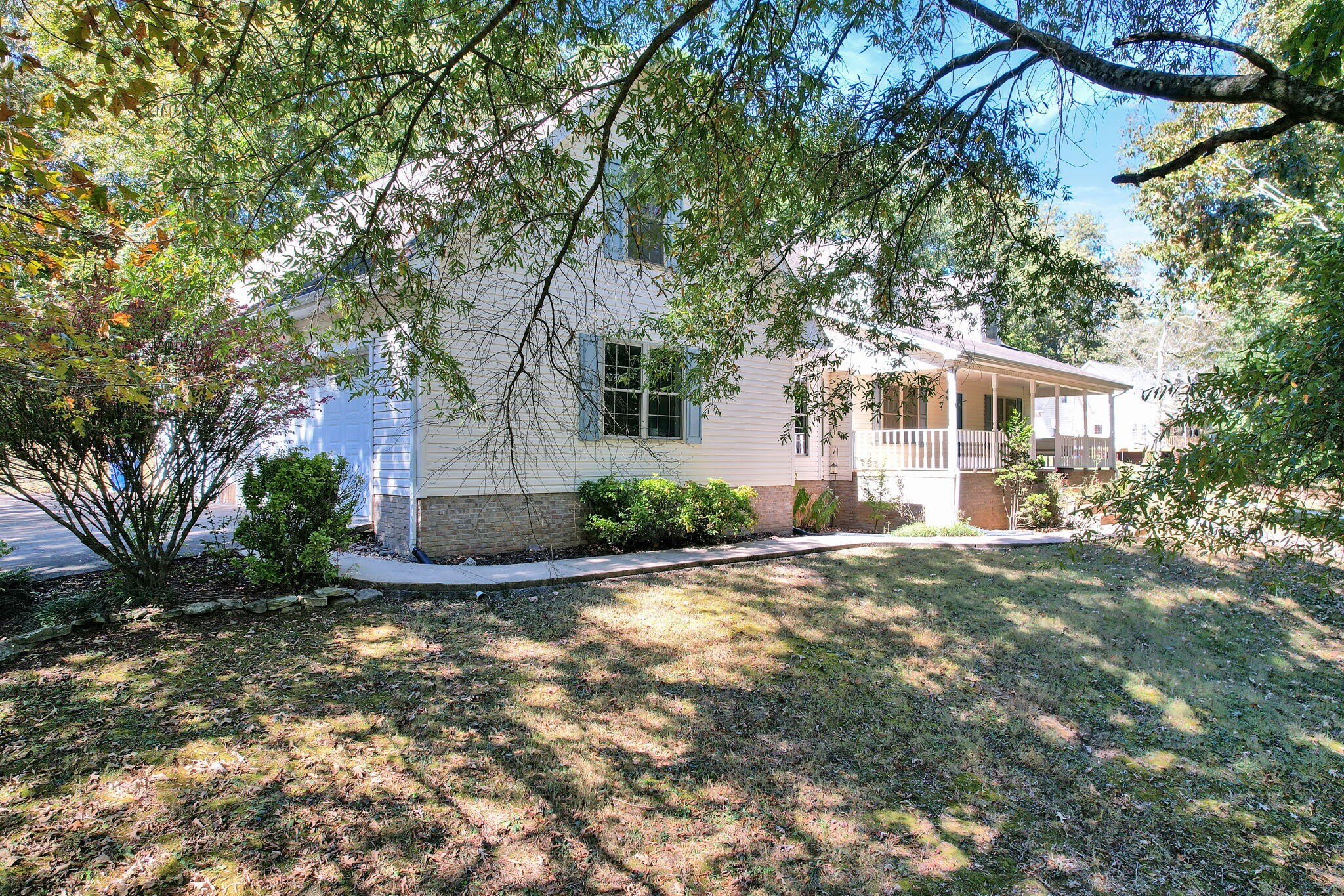 1582 Eads Bluff Road Northwest Georgetown, TN 37336 - Photo 50 of 57 a front view of a house with a garden and tree