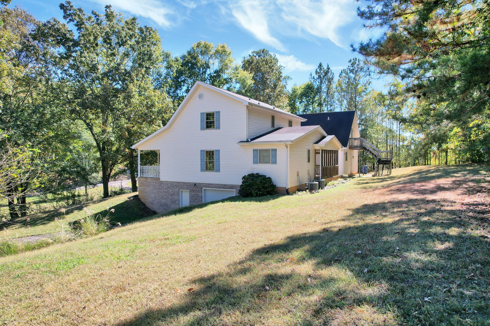 1582 Eads Bluff Road Northwest Georgetown, TN 37336 - Photo 54 of 57 a front view of a house with a yard and garage