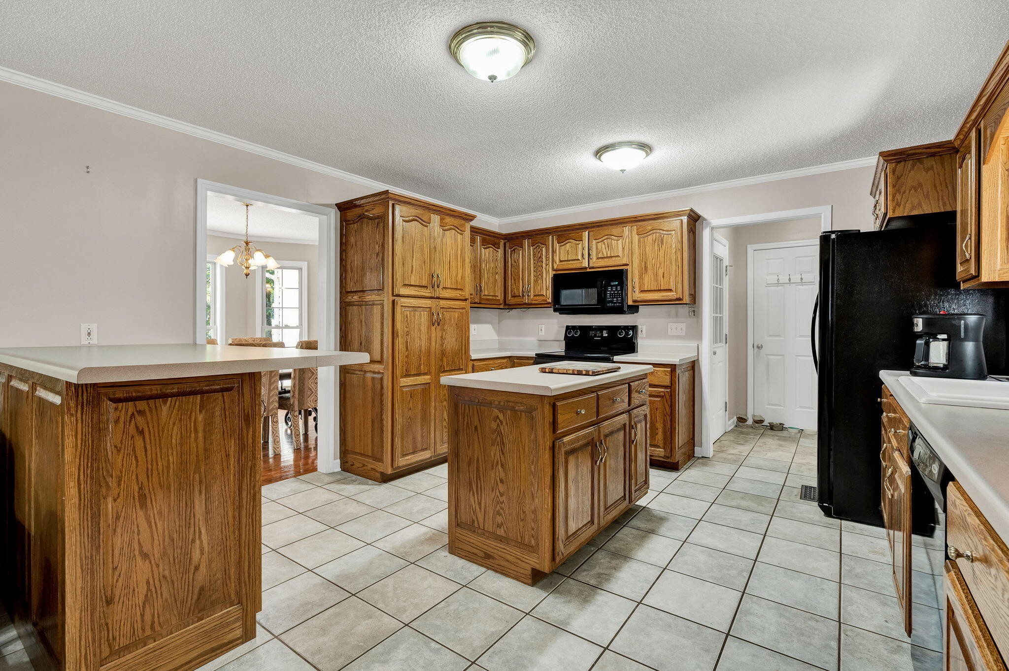 1582 Eads Bluff Road Northwest Georgetown, TN 37336 - Photo 7 of 57 a kitchen with stainless steel appliances granite countertop a refrigerator and a stove top oven