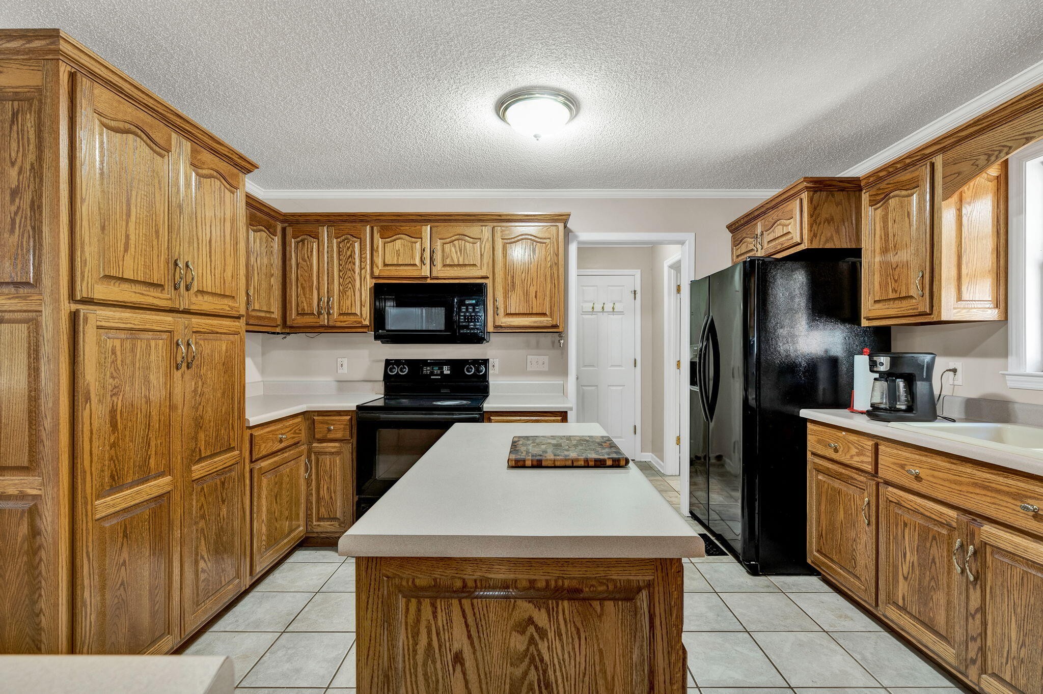 1582 Eads Bluff Road Northwest Georgetown, TN 37336 - Photo 8 of 57 a kitchen with cabinets and stainless steel appliances