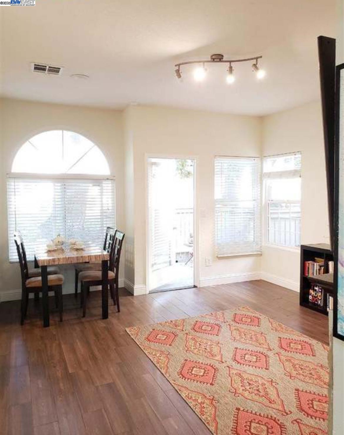 1405 Forest Run Hercules, CA 94547 - Photo 16 of 21 a view of a dining room with furniture and wooden floor