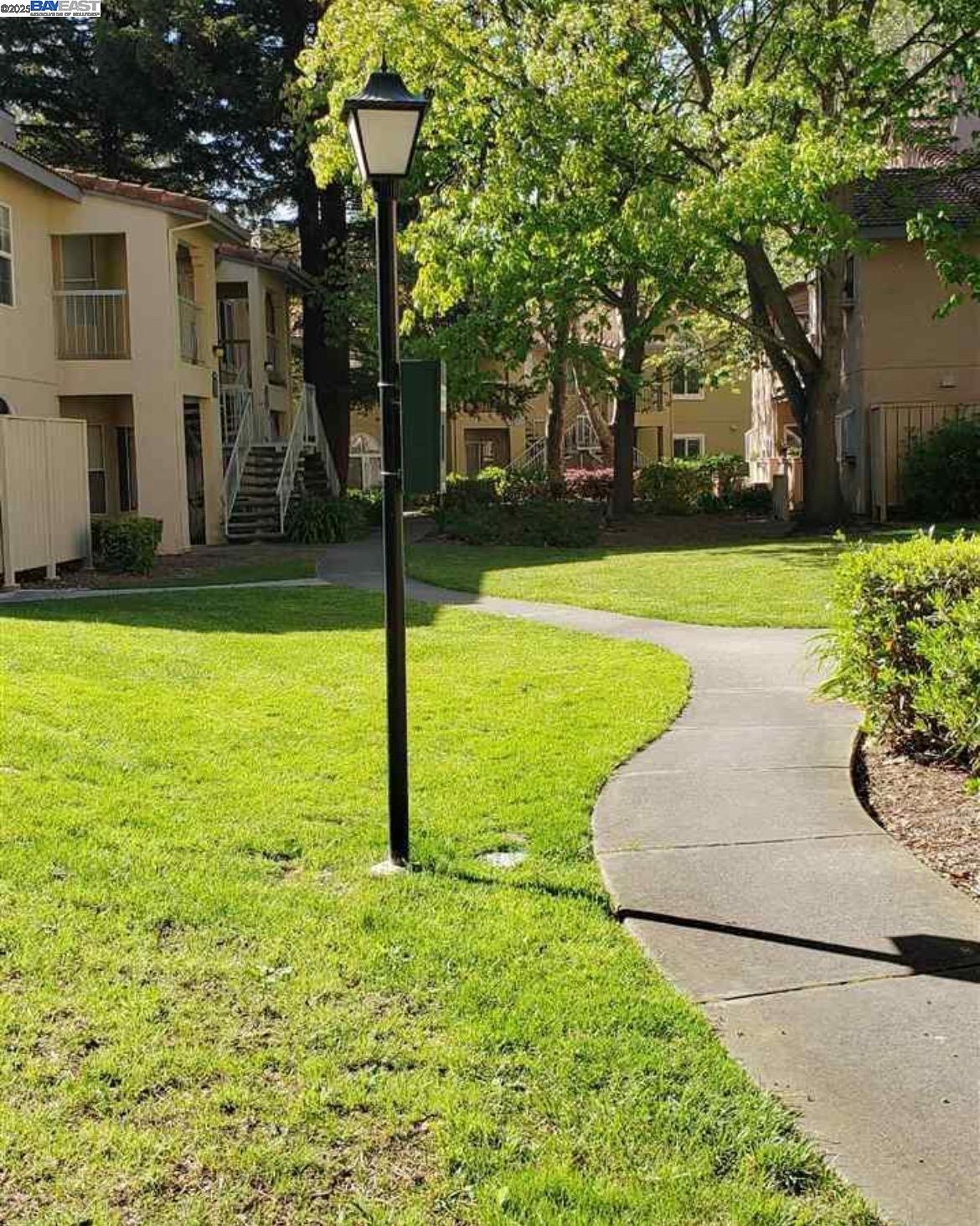 1405 Forest Run Hercules, CA 94547 - Photo 18 of 21 a view of swimming pool with garden and trees