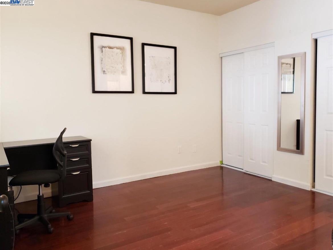 1405 Forest Run Hercules, CA 94547 - Photo 7 of 21 a view of a livingroom with wooden floor and a workspace