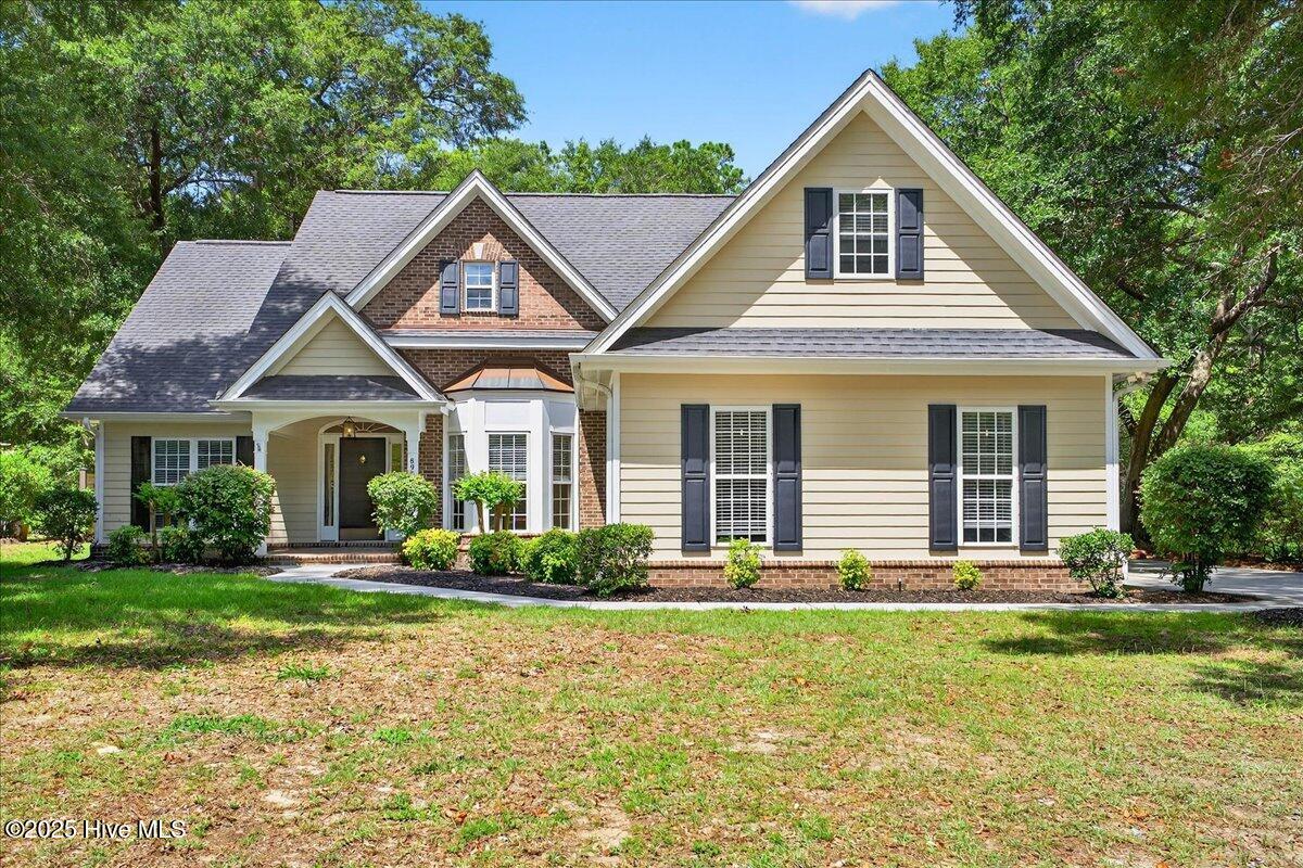 8985 Woodbine Road Southwest Sunset Beach, NC 28468 - Photo 1 of 65 Front exterior