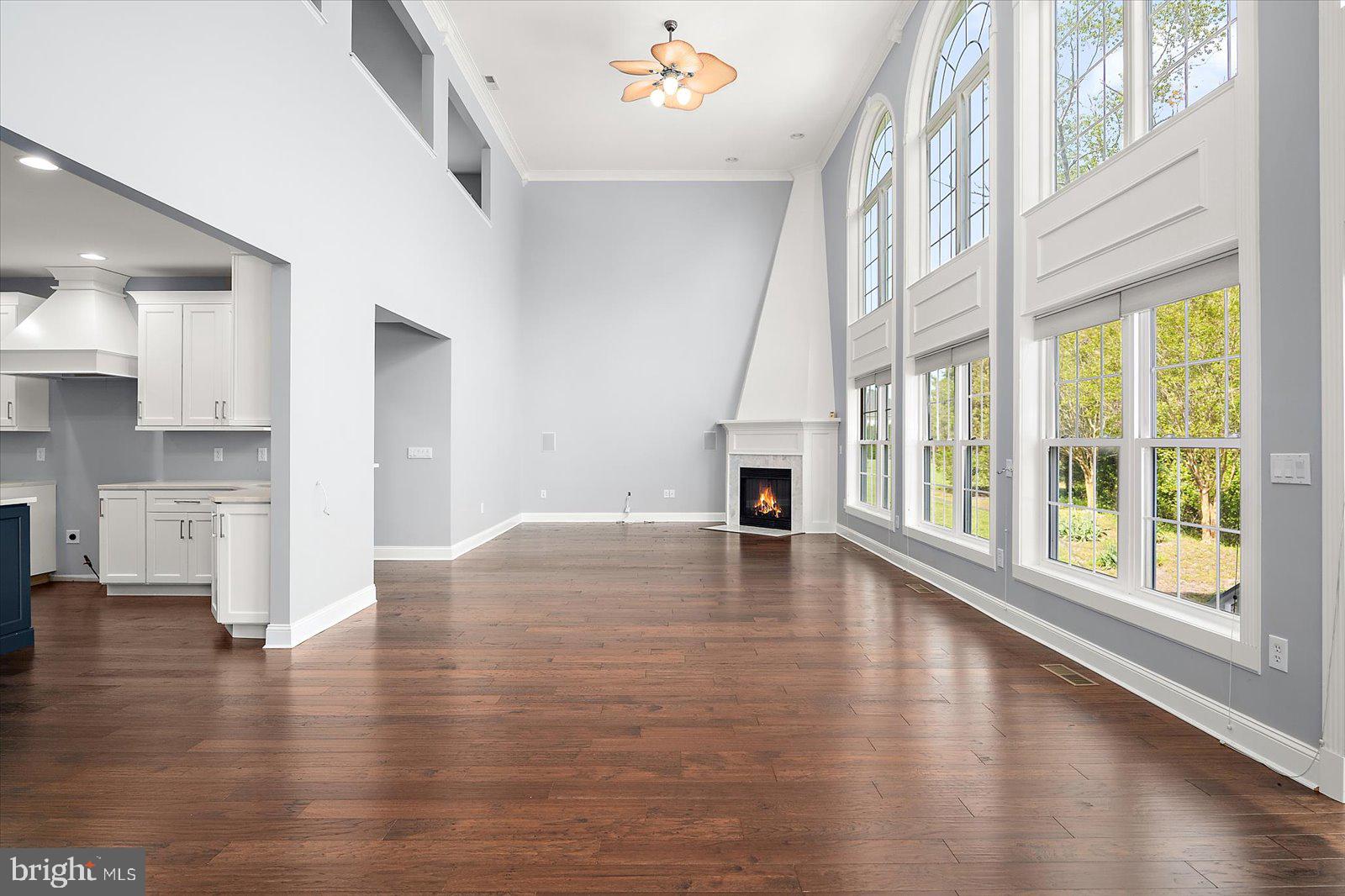 3431 Redden Ferry Road Eden, MD 21822 - Photo 23 of 103 a view of an empty room with wooden floor and a window