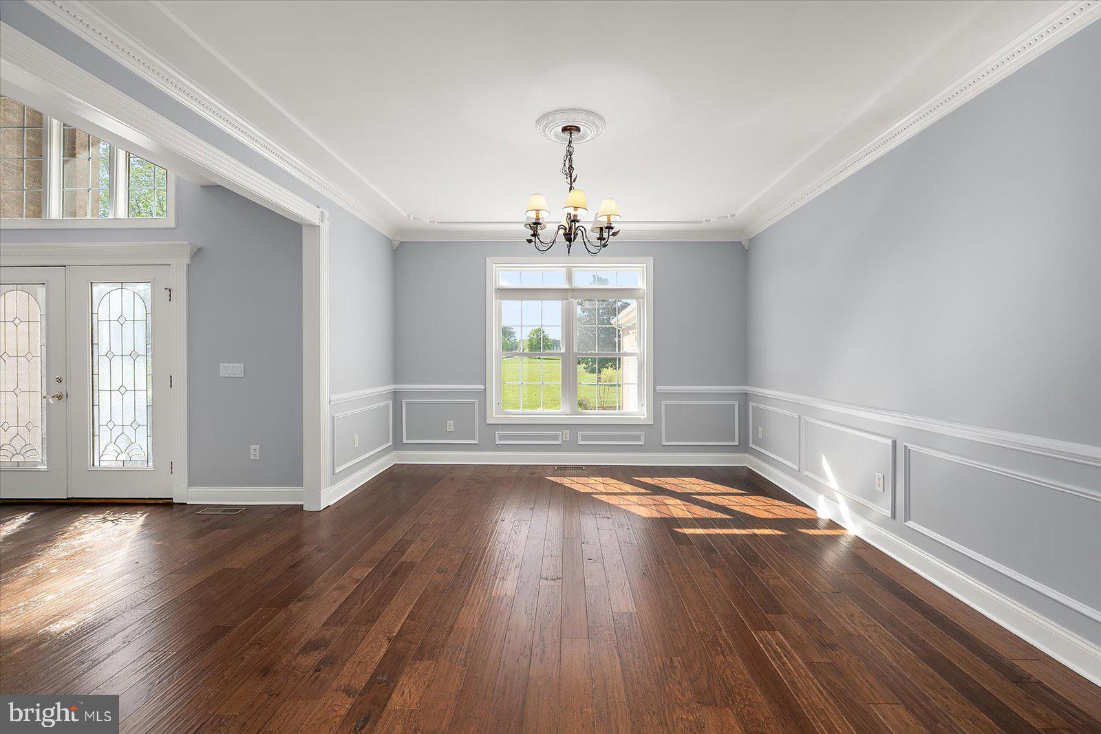 3431 Redden Ferry Road Eden, MD 21822 - Photo 35 of 103 a view of an empty room with wooden floor and a window