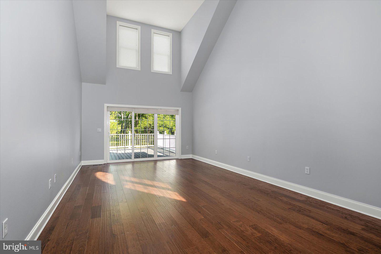 3431 Redden Ferry Road Eden, MD 21822 - Photo 39 of 103 a view of an empty room with wooden floor and a window