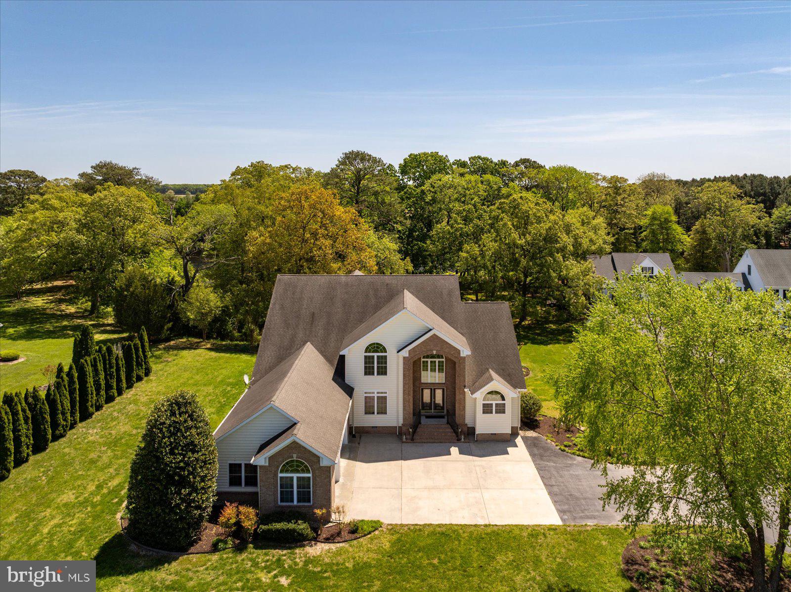 3431 Redden Ferry Road Eden, MD 21822 - Photo 5 of 103 a front view of a house with a yard and garage