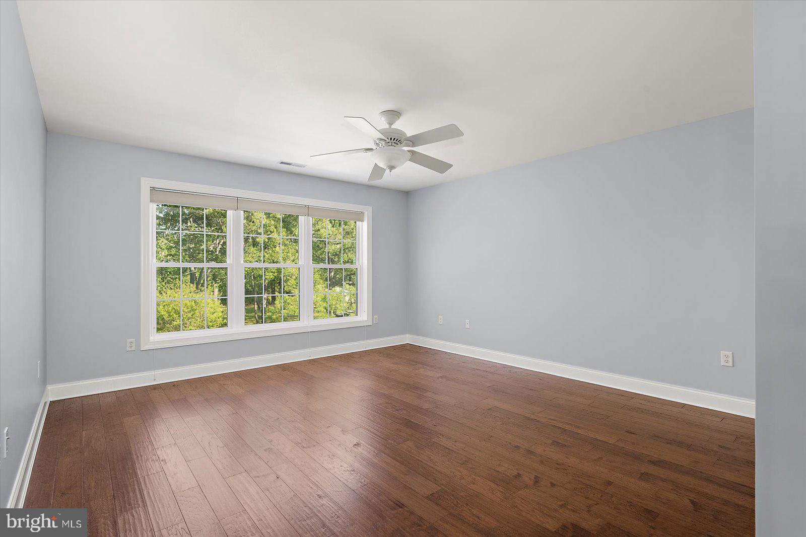 3431 Redden Ferry Road Eden, MD 21822 - Photo 61 of 103 a view of an empty room with wooden floor and a window