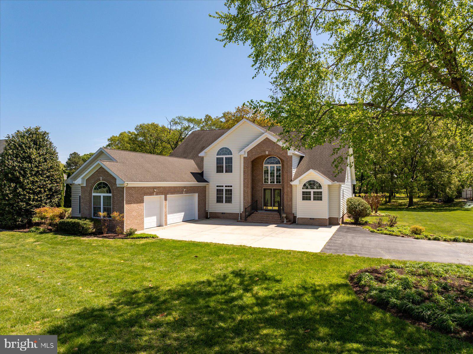 3431 Redden Ferry Road Eden, MD 21822 - Photo 86 of 103 a front view of a house with a yard and trees