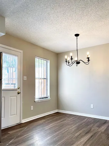 a view of empty room with windows