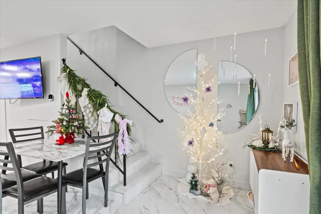 a backyard of a house with outdoor seating