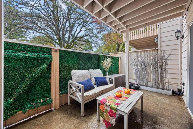 a view of a two chairs in the roof deck