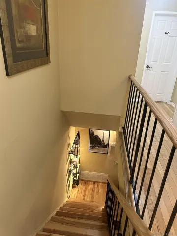 a view of balcony with wooden floor