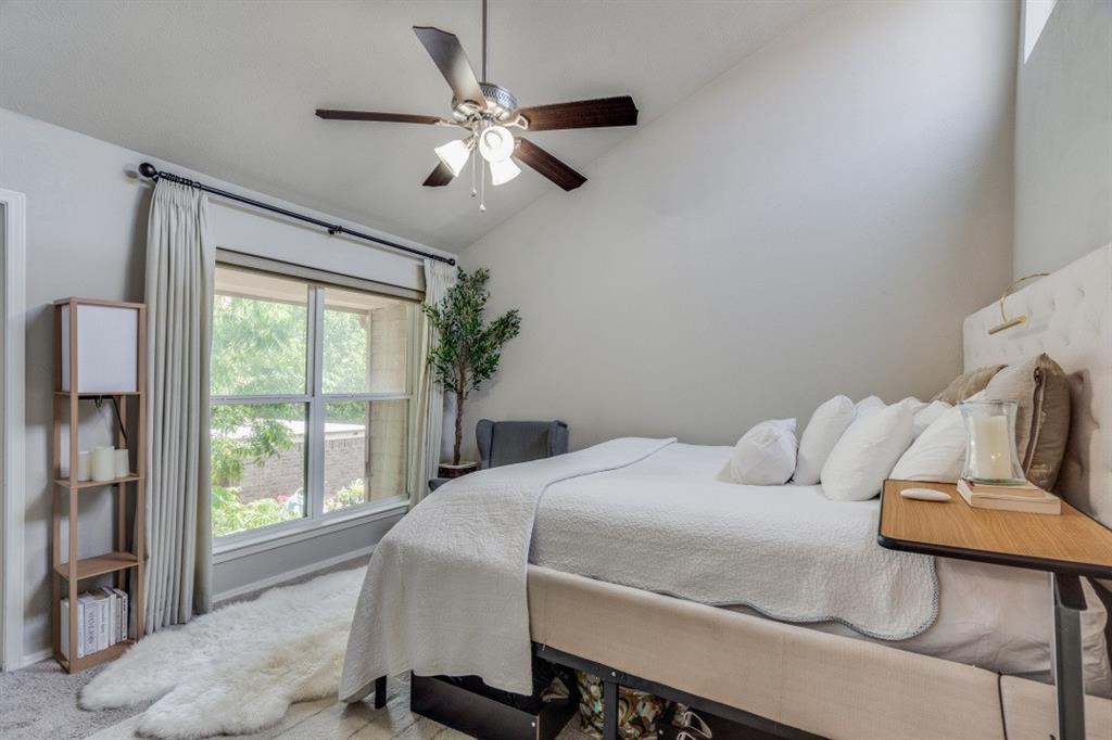 3736 Vitruvian Way, Unit D5 Addison, TX 75001 - Photo 11 of 27 a bedroom with a bed and a large window