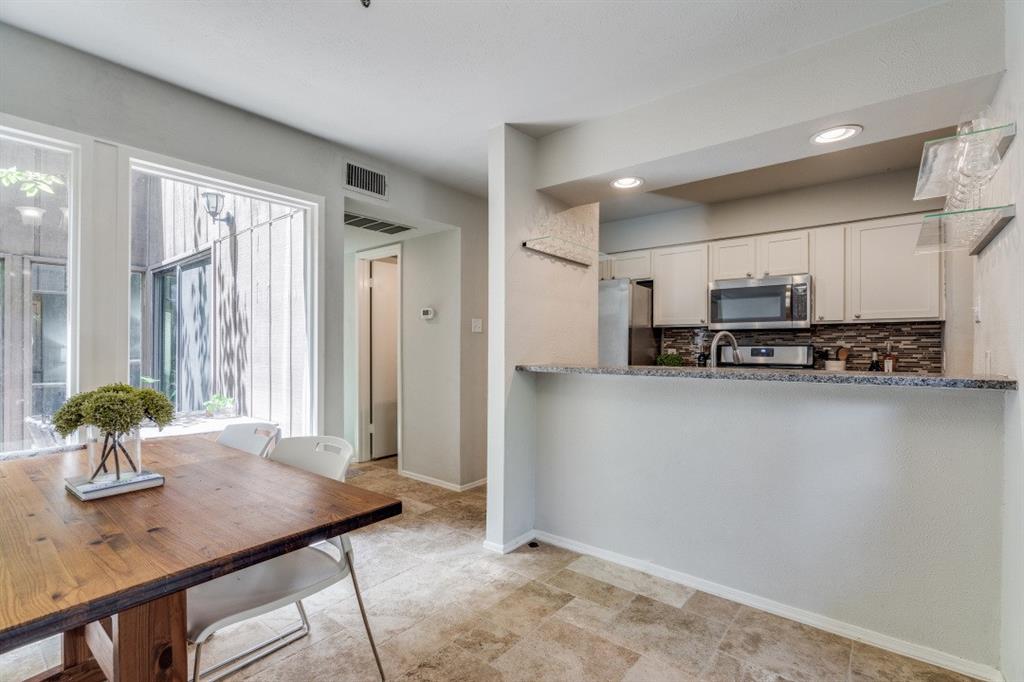 3736 Vitruvian Way, Unit D5 Addison, TX 75001 - Photo 6 of 27 a view of kitchen with stainless steel appliances granite countertop a refrigerator and a sink