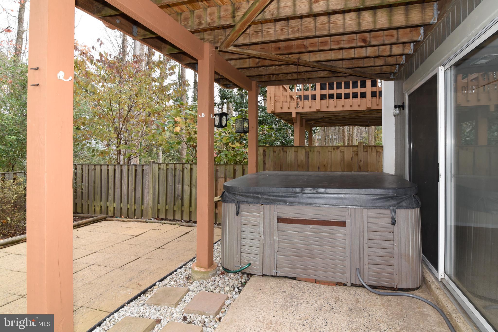 2334 Generation Drive Reston, VA 20191 - Photo 51 of 55 Hot tub and fenced back patio.
