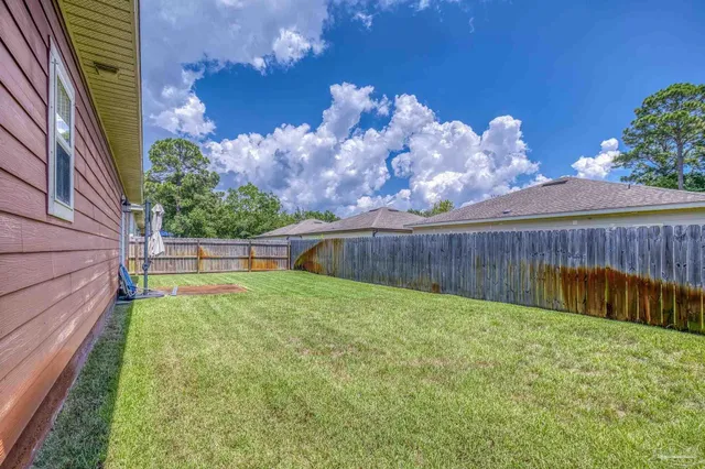 a view of a backyard with a garden