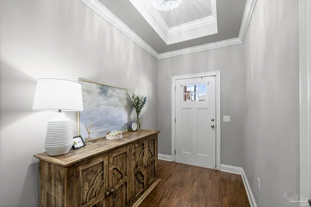 a bathroom with a sink a mirror and vanity